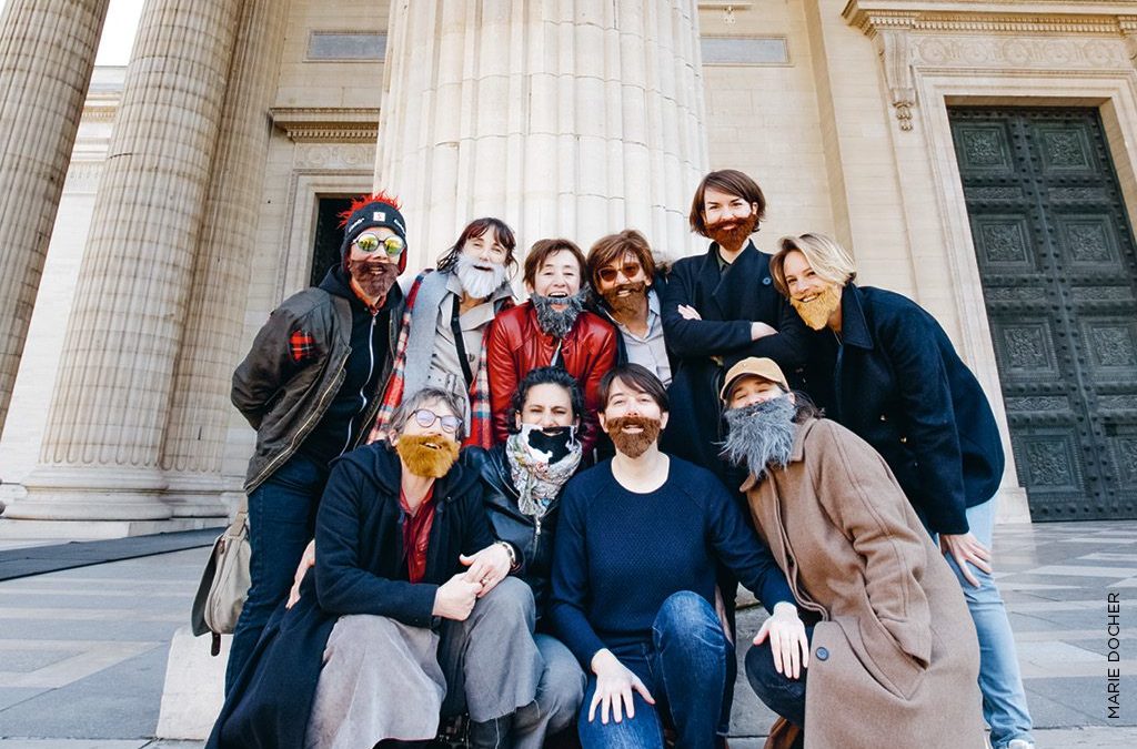 Des membres du collectif La Barbe, à Paris, devant le Panthéon, le 19 mars 2022.